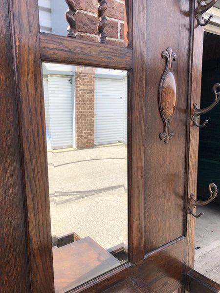 Antique Carved Tiger Oak Hall Tree with Beveled Glass and Glove Box
