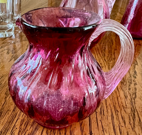 Pilgrim Glass Set of 4 Cranberry Glass Pitchers of Varying Heights