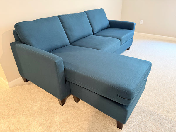 Navy Upholstered Reversible Sectional Sofa and Chaise