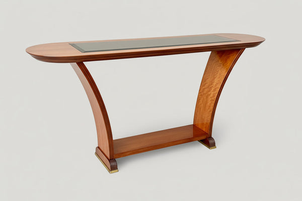 Wooden console table with decorative items and plants in a room.